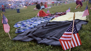 Families gather for fireworks on the levee. Photo by Mike Rhodes
