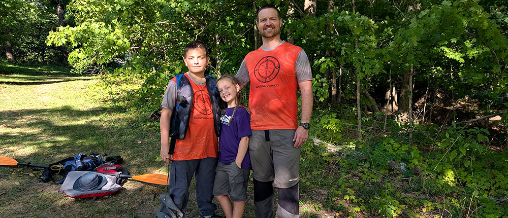 Ryan Hunter with two of his kids during a race. Photo provided.